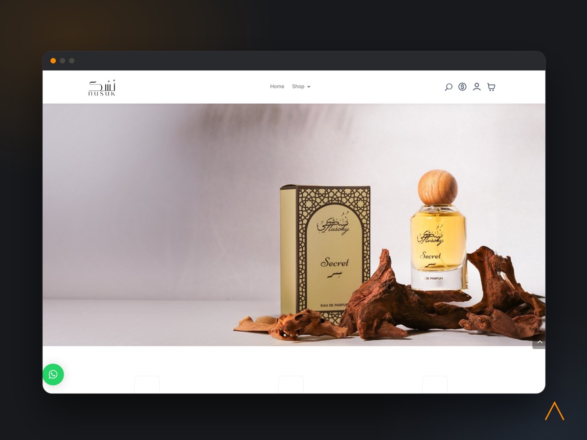 The Nusuk storefront home page, showing the perfume collection.